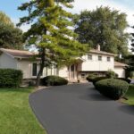 Asphalt Paved Driveway Crumbling